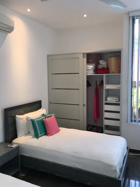 Twin bedroom and closet